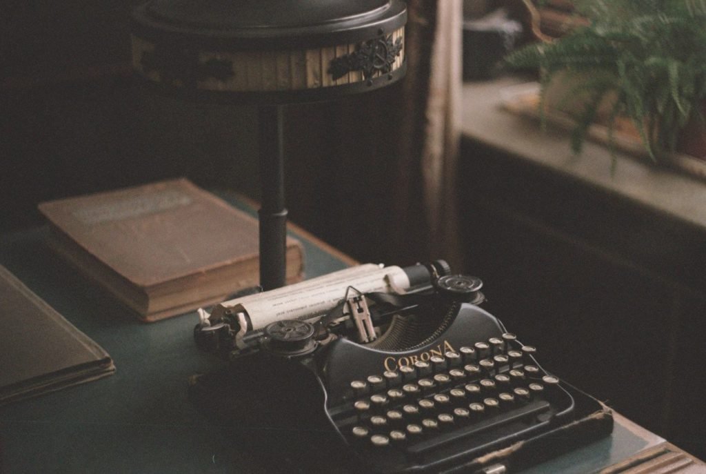 A vintage typewriter on a desk